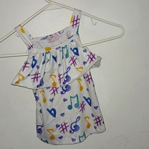 Pete and Lucy musical note tank with shoulder set straps .